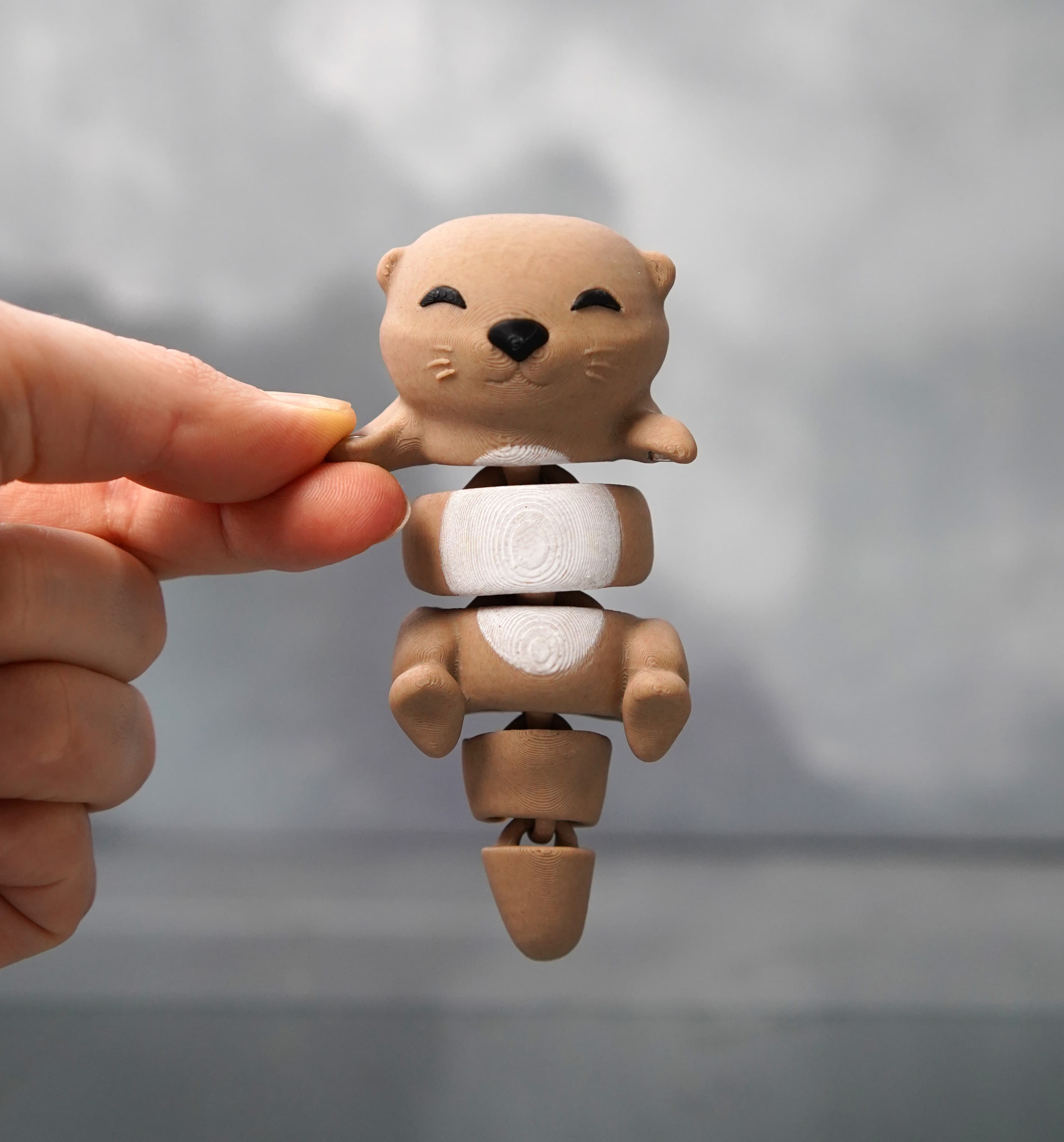 Otis the Flexi Otter - 3D printed articulated fidget keychain 6